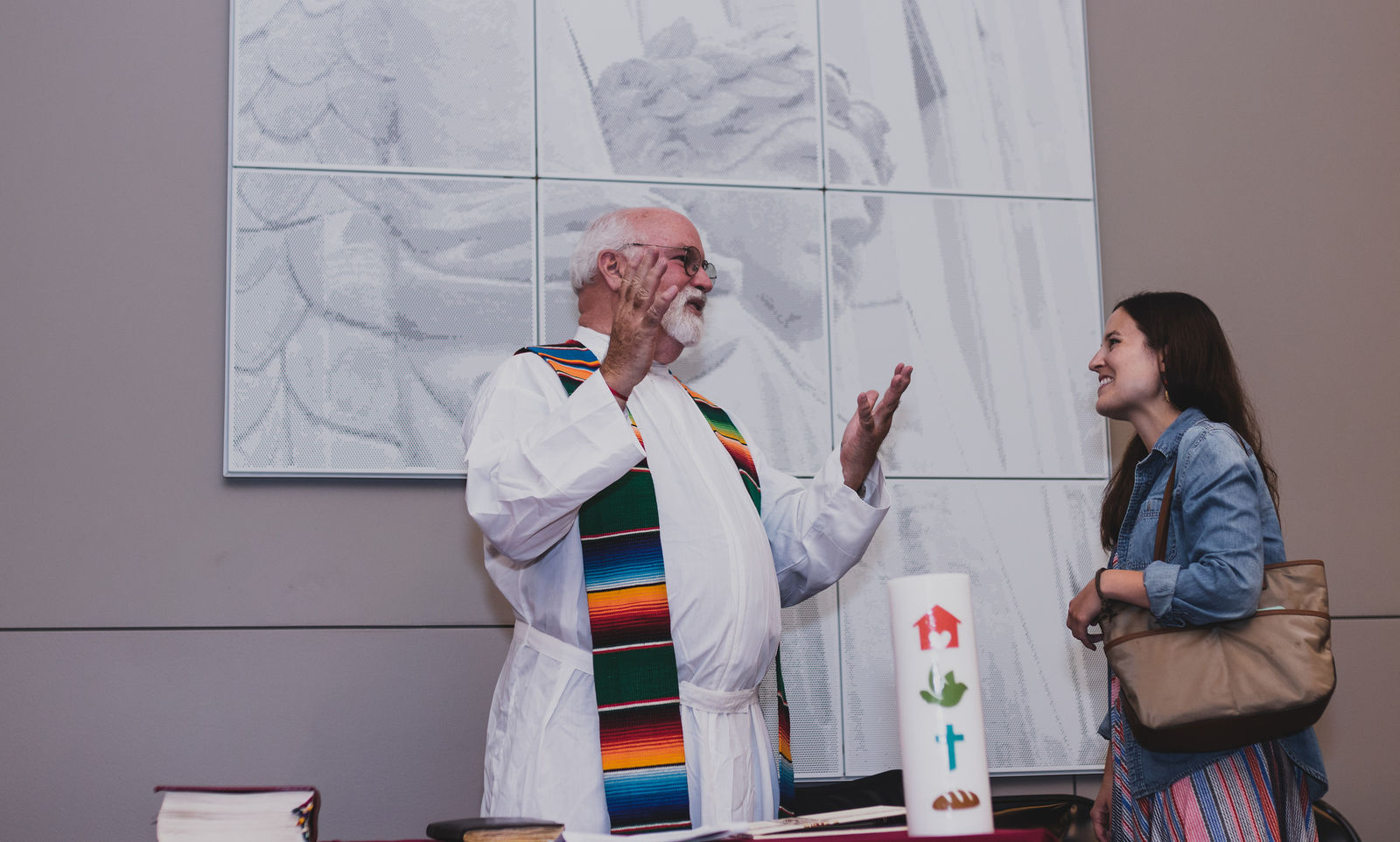 Fr. Greg Boyle talks with a Jesuit Volunteer before 2018 Orientation commissioning mass.