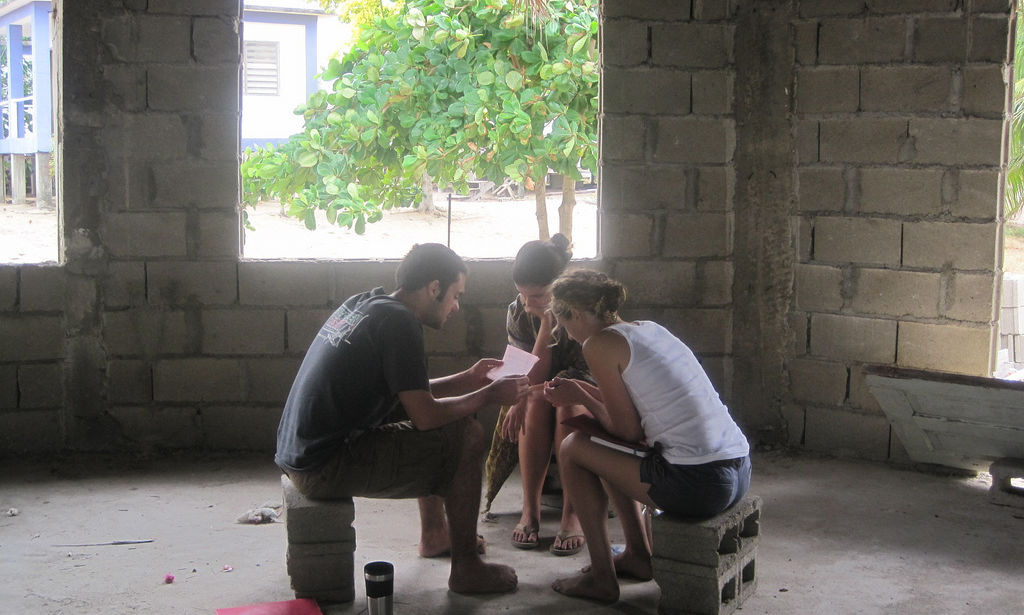 Jesuit Volunteers serving internationally with JVC in Punta Gorda, Belize in a new building structure. (2011)