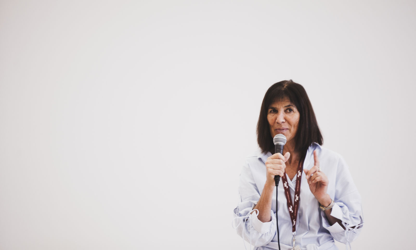 Gloria McDowell, director of programs addresses the new cohort of volunteers. (2018)