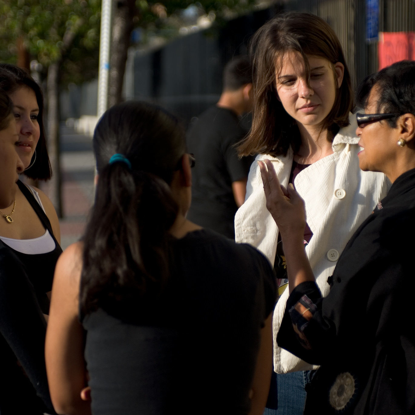 Jesuit Volunteer engaging in a conversation on social justice issues in the local community. (2010)