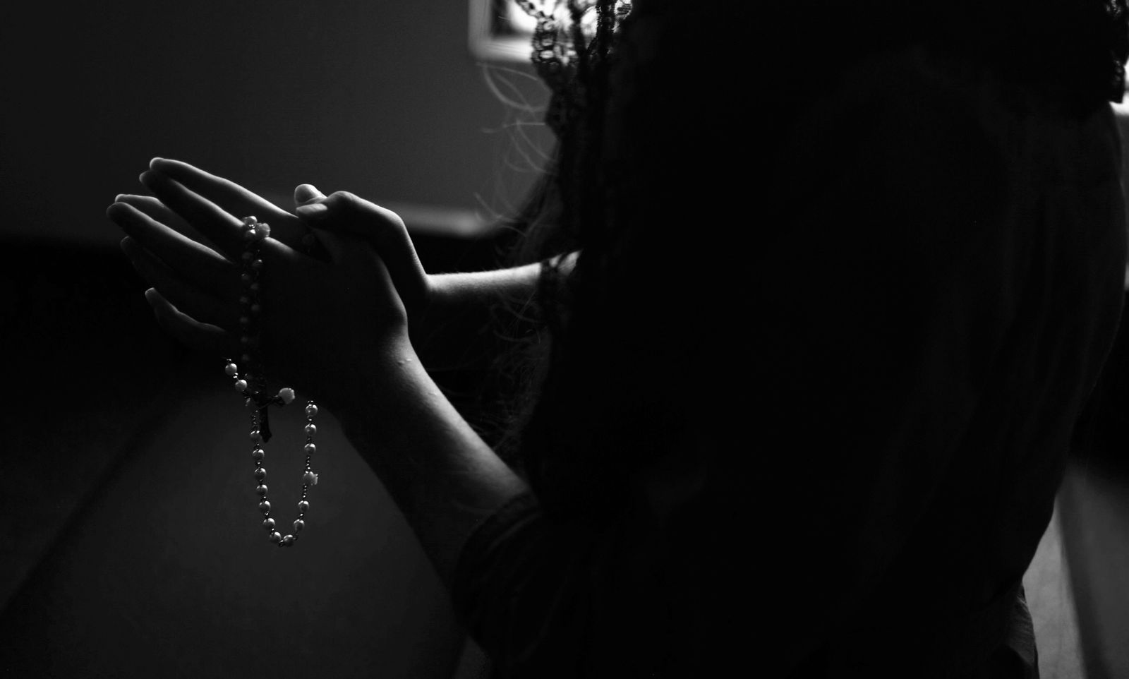 Hands held in prayer