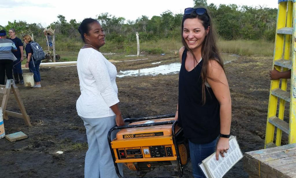 Cleaning up after Ms. Irma’s house blessing with my coworker, Rashida. (Belize 2018)