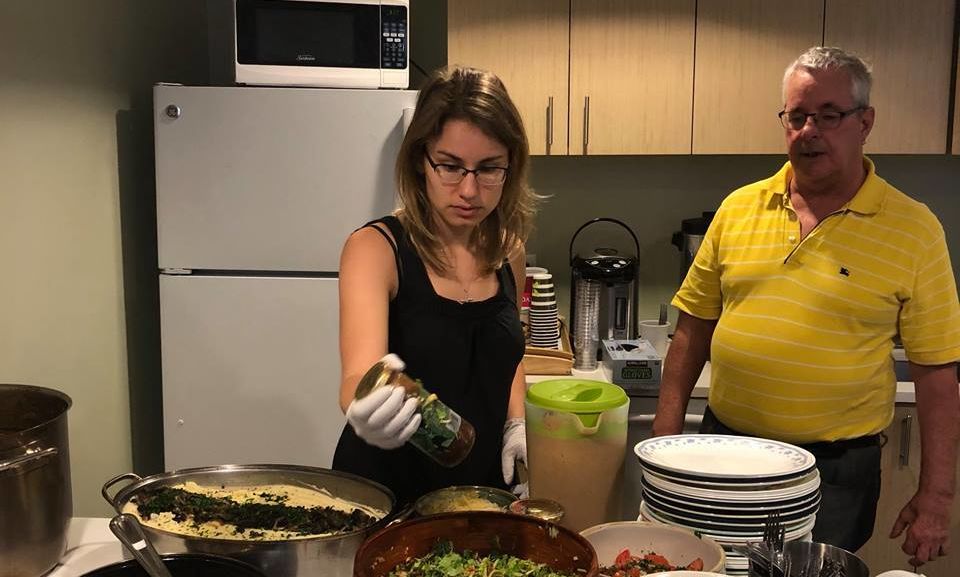 Suzy Lefelhocz serving food at Georgetown University Campus Ministry Center